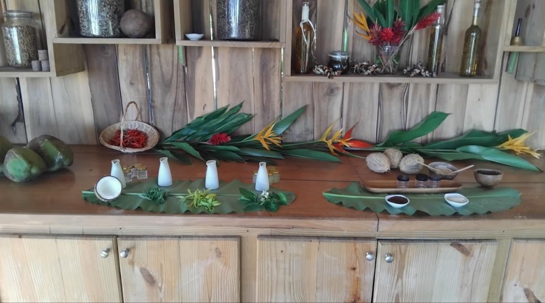 A serving station dressed with leaves and flowers