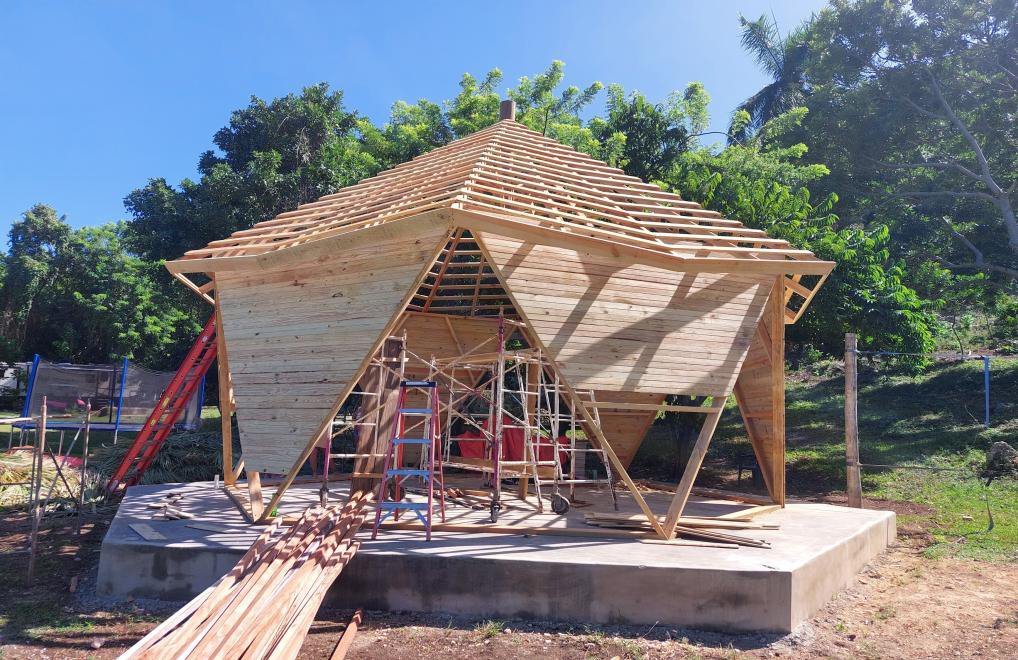 The dome under construction with a shingle roof