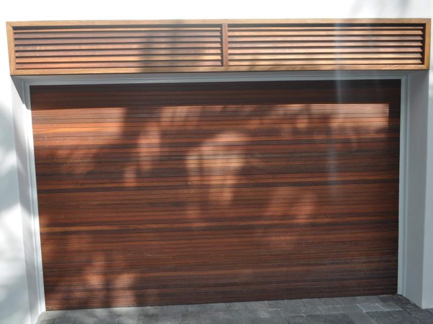 A hardwood slatted garage door